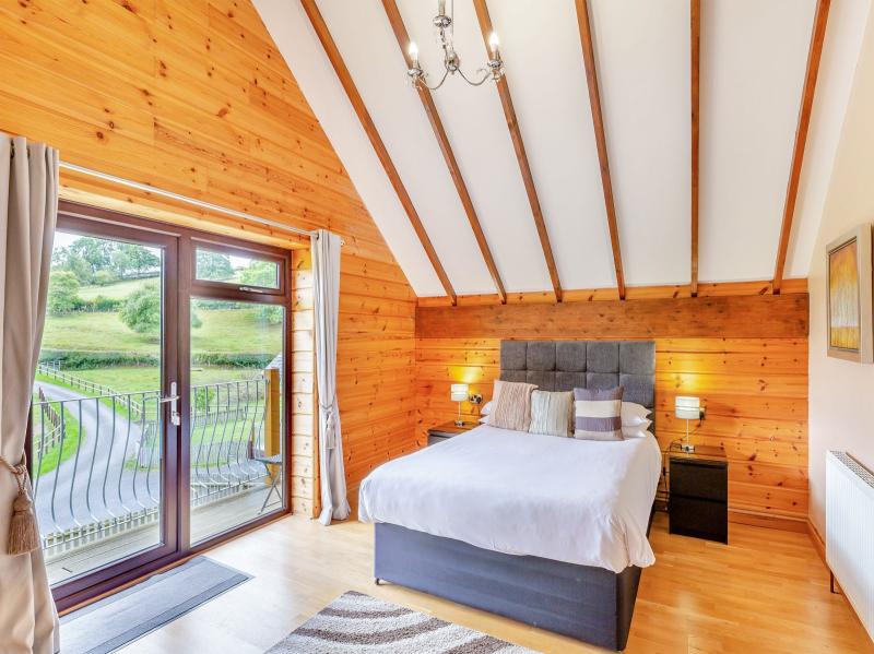 Master bedroom with double bed and stunning views